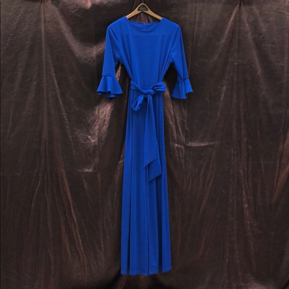 Blue Romper with ruffles to sleeves